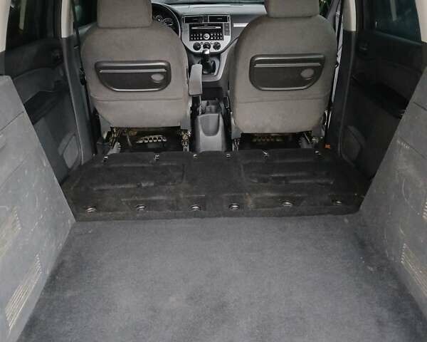 Черный Форд Си-Макс, объемом двигателя 1.8 л и пробегом 224 тыс. км за 3999 $, фото 14 на Automoto.ua