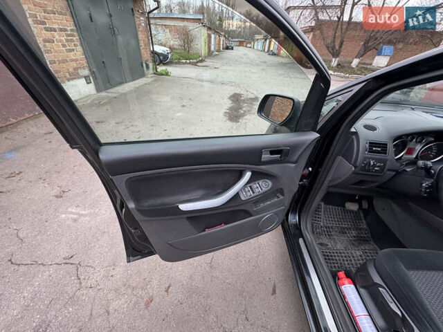 Черный Форд Си-Макс, объемом двигателя 2 л и пробегом 190 тыс. км за 4999 $, фото 8 на Automoto.ua