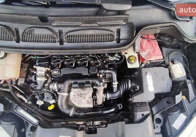 Черный Форд Си-Макс, объемом двигателя 1.6 л и пробегом 277 тыс. км за 5500 $, фото 9 на Automoto.ua