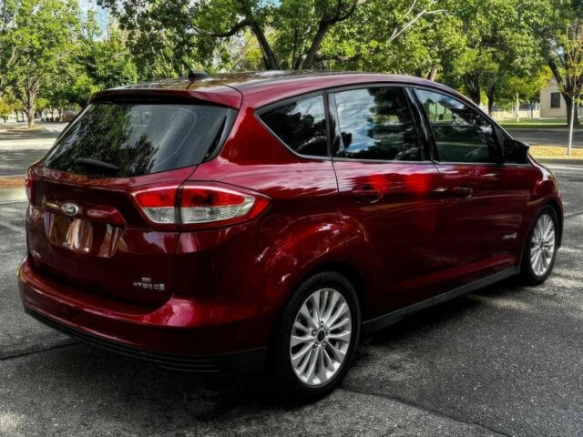 Красный Форд Си-Макс, объемом двигателя 2 л и пробегом 57 тыс. км за 6300 $, фото 5 на Automoto.ua