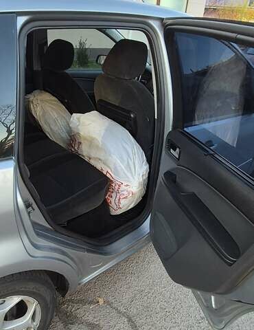 Серый Форд Си-Макс, объемом двигателя 2 л и пробегом 385 тыс. км за 5000 $, фото 14 на Automoto.ua