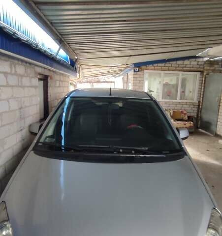 Серый Форд Си-Макс, объемом двигателя 2 л и пробегом 218 тыс. км за 5899 $, фото 4 на Automoto.ua