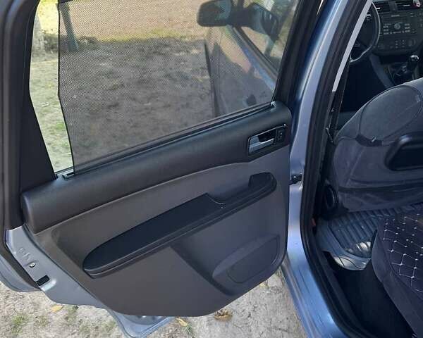 Синій Форд Сі-Макс, об'ємом двигуна 2 л та пробігом 322 тис. км за 4674 $, фото 1 на Automoto.ua