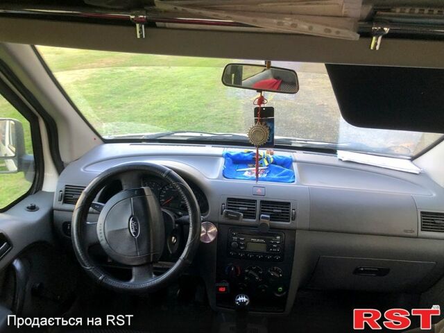 Белый Форд Коннект, объемом двигателя 1.8 л и пробегом 434 тыс. км за 2700 $, фото 3 на Automoto.ua