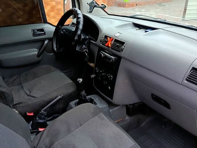 Білий Форд Коннект, об'ємом двигуна 1.8 л та пробігом 210 тис. км за 3800 $, фото 11 на Automoto.ua