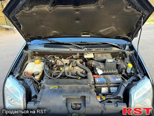 Черный Форд Коннект, объемом двигателя 1.8 л и пробегом 190 тыс. км за 7000 $, фото 12 на Automoto.ua