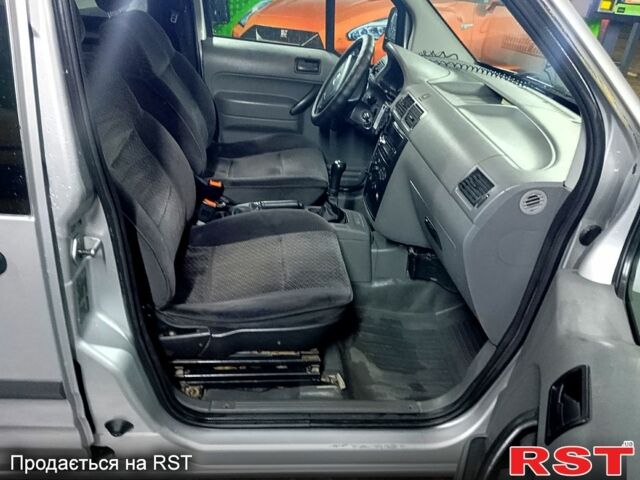 Серый Форд Коннект, объемом двигателя 1.8 л и пробегом 370 тыс. км за 4250 $, фото 5 на Automoto.ua