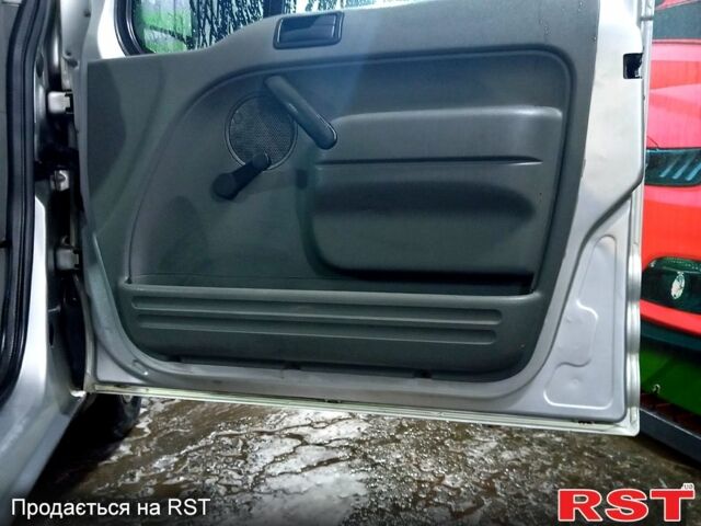 Серый Форд Коннект, объемом двигателя 1.8 л и пробегом 370 тыс. км за 4250 $, фото 6 на Automoto.ua