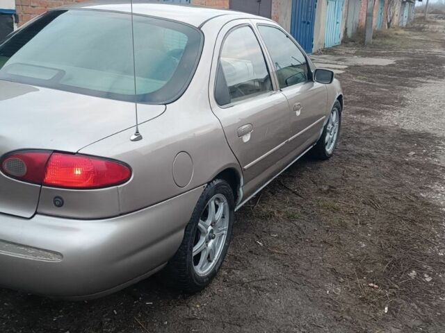 Форд Контур 1995 в Харькове на Automoto.ua Бежевый Форд Контур, объемом двигателя 2 л и пробегом 300 тыс. км за 2000 $, фото 1 на Automoto.ua