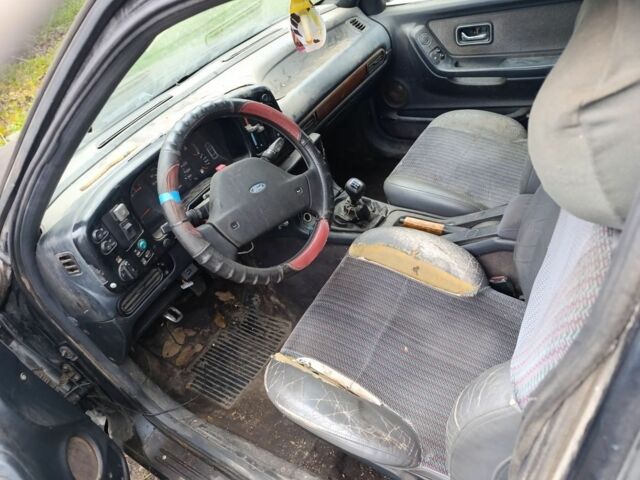 Черный Форд Контур, объемом двигателя 2.8 л и пробегом 100 тыс. км за 475 $, фото 4 на Automoto.ua