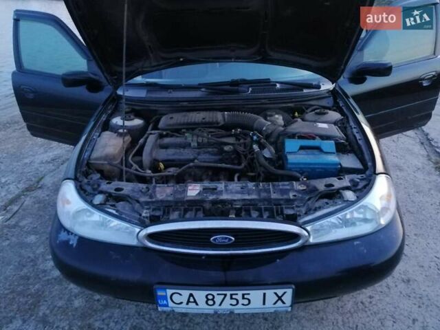 Чорний Форд Контур, об'ємом двигуна 2 л та пробігом 358 тис. км за 1400 $, фото 4 на Automoto.ua