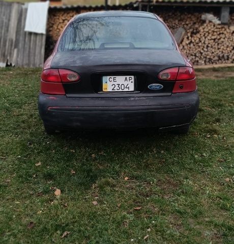 Красный Форд Контур, объемом двигателя 2 л и пробегом 130 тыс. км за 1166 $, фото 2 на Automoto.ua