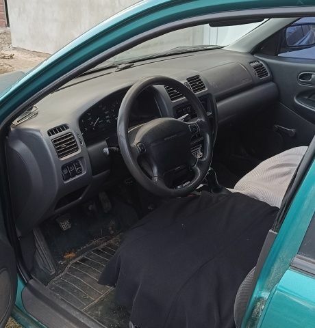 Красный Форд Контур, объемом двигателя 2 л и пробегом 130 тыс. км за 1166 $, фото 7 на Automoto.ua