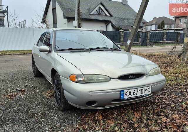 Сірий Форд Контур, об'ємом двигуна 2 л та пробігом 270 тис. км за 1200 $, фото 1 на Automoto.ua