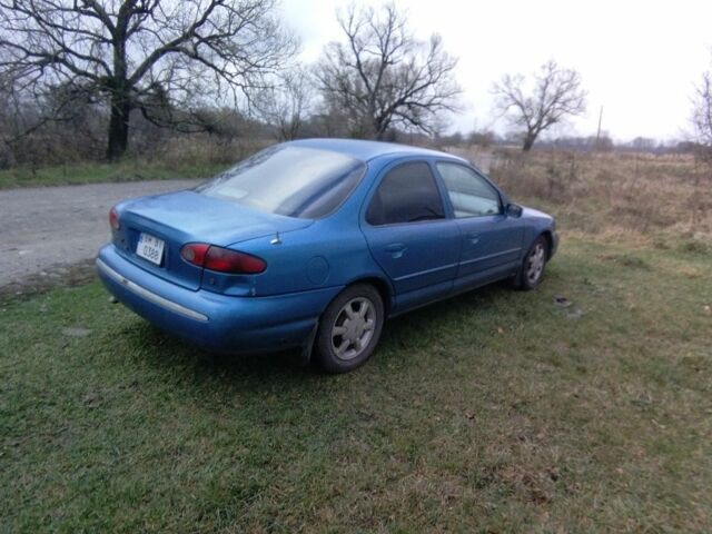 Зеленый Форд Контур, объемом двигателя 2 л и пробегом 240 тыс. км за 1300 $, фото 1 на Automoto.ua