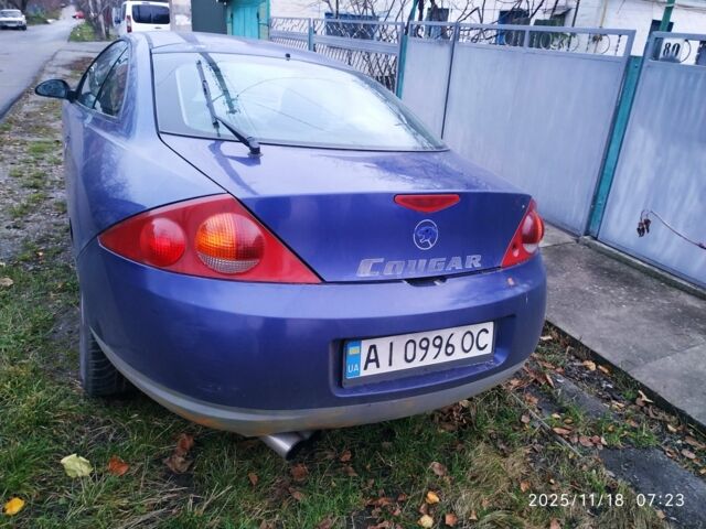 Синий Форд Кугар, объемом двигателя 2 л и пробегом 283 тыс. км за 2000 $, фото 1 на Automoto.ua