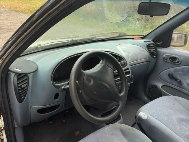 Білий Форд Кур'єр, об'ємом двигуна 1.8 л та пробігом 193 тис. км за 643 $, фото 7 на Automoto.ua