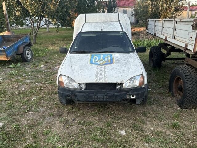 Білий Форд Кур'єр, об'ємом двигуна 1.3 л та пробігом 240 тис. км за 750 $, фото 3 на Automoto.ua