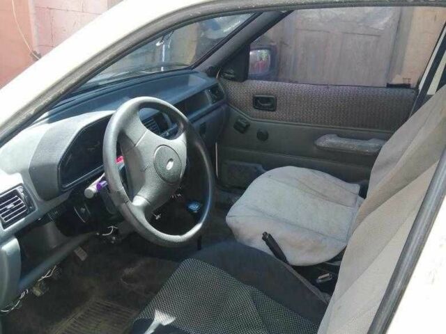 Белый Форд Курьер, объемом двигателя 1.3 л и пробегом 500 тыс. км за 899 $, фото 5 на Automoto.ua