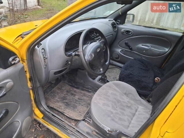 Желтый Форд Курьер, объемом двигателя 1.8 л и пробегом 139 тыс. км за 600 $, фото 5 на Automoto.ua