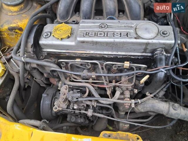 Желтый Форд Курьер, объемом двигателя 1.8 л и пробегом 139 тыс. км за 600 $, фото 3 на Automoto.ua