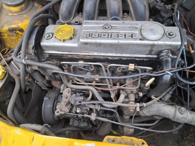 Желтый Форд Курьер, объемом двигателя 1.8 л и пробегом 139 тыс. км за 600 $, фото 4 на Automoto.ua