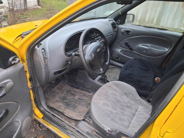 Желтый Форд Курьер, объемом двигателя 1.8 л и пробегом 139 тыс. км за 600 $, фото 6 на Automoto.ua