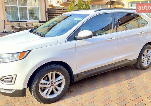 Белый Форд Эдж, объемом двигателя 2 л и пробегом 206 тыс. км за 16500 $, фото 1 на Automoto.ua