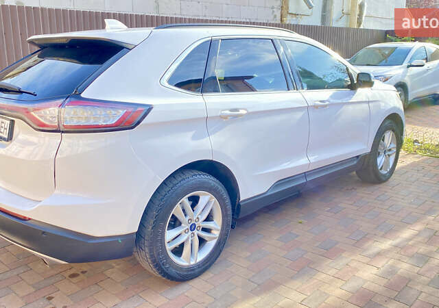 Белый Форд Эдж, объемом двигателя 2 л и пробегом 206 тыс. км за 16500 $, фото 3 на Automoto.ua