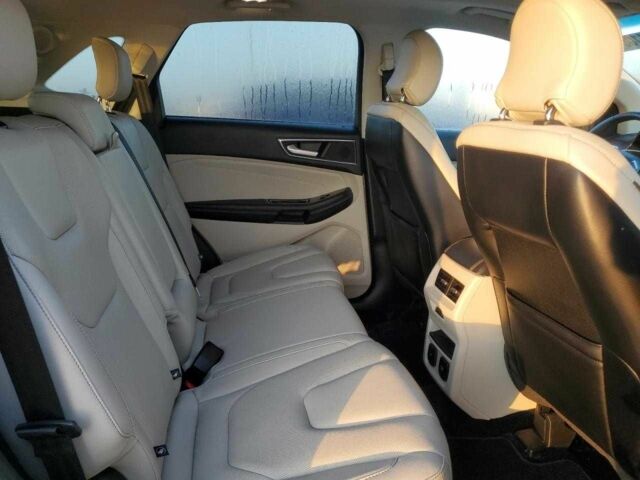 Білий Форд Едж, об'ємом двигуна 2 л та пробігом 70 тис. км за 2000 $, фото 9 на Automoto.ua