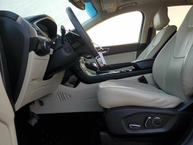 Білий Форд Едж, об'ємом двигуна 2 л та пробігом 70 тис. км за 2000 $, фото 6 на Automoto.ua