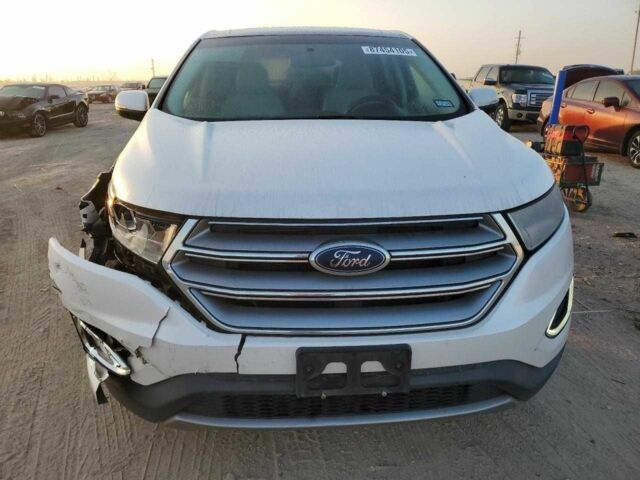 Білий Форд Едж, об'ємом двигуна 2 л та пробігом 70 тис. км за 2000 $, фото 4 на Automoto.ua