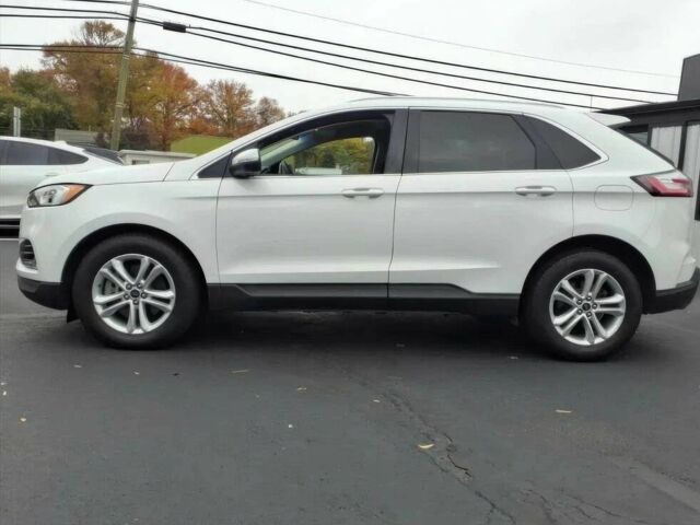 Білий Форд Едж, об'ємом двигуна 2 л та пробігом 50 тис. км за 11700 $, фото 6 на Automoto.ua