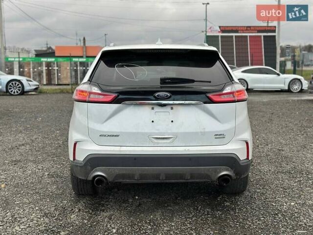 Білий Форд Едж, об'ємом двигуна 2 л та пробігом 173 тис. км за 12800 $, фото 4 на Automoto.ua