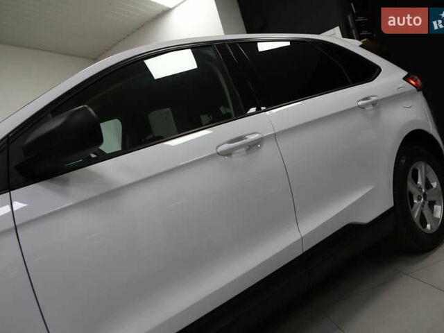 Белый Форд Эдж, объемом двигателя 2 л и пробегом 234 тыс. км за 13900 $, фото 17 на Automoto.ua