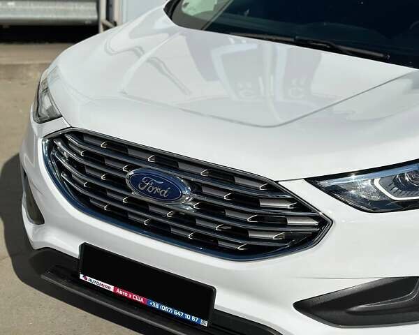 Білий Форд Едж, об'ємом двигуна 2 л та пробігом 103 тис. км за 18200 $, фото 4 на Automoto.ua