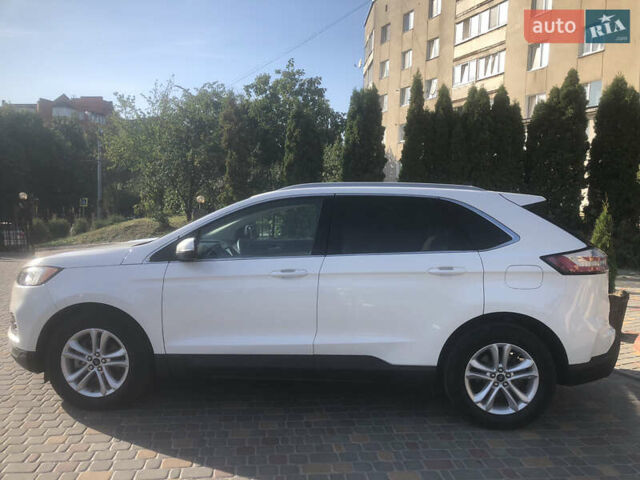 Белый Форд Эдж, объемом двигателя 2 л и пробегом 111 тыс. км за 19500 $, фото 4 на Automoto.ua