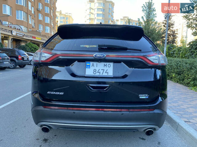 Черный Форд Эдж, объемом двигателя 2 л и пробегом 205 тыс. км за 16500 $, фото 3 на Automoto.ua