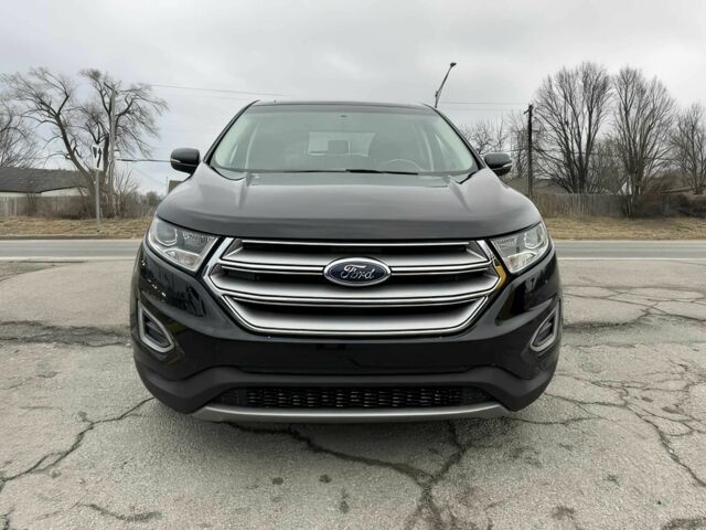 Черный Форд Эдж, объемом двигателя 2 л и пробегом 77 тыс. км за 7900 $, фото 1 на Automoto.ua