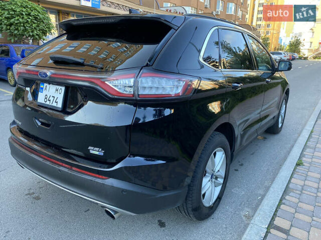 Черный Форд Эдж, объемом двигателя 2 л и пробегом 205 тыс. км за 16500 $, фото 5 на Automoto.ua