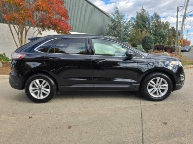 Черный Форд Эдж, объемом двигателя 2 л и пробегом 64 тыс. км за 15700 $, фото 3 на Automoto.ua