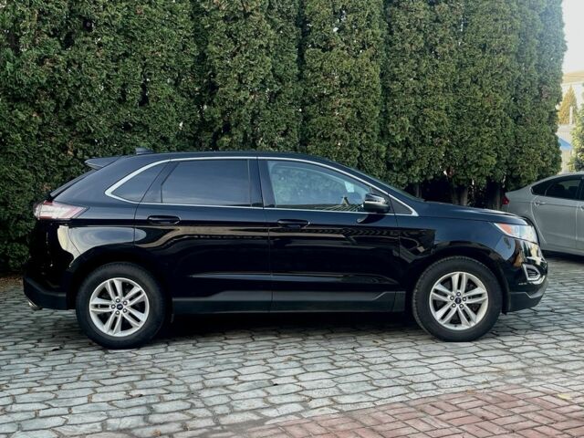 Черный Форд Эдж, объемом двигателя 2 л и пробегом 76 тыс. км за 18200 $, фото 1 на Automoto.ua