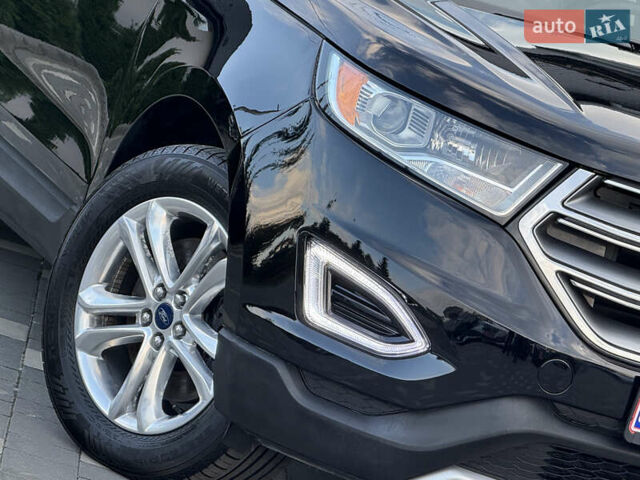 Черный Форд Эдж, объемом двигателя 2 л и пробегом 150 тыс. км за 15950 $, фото 7 на Automoto.ua