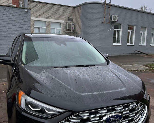 Черный Форд Эдж, объемом двигателя 2 л и пробегом 146 тыс. км за 22500 $, фото 1 на Automoto.ua