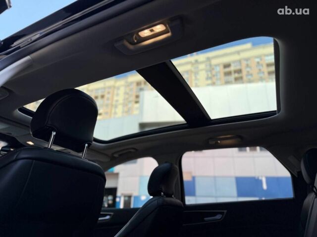 Черный Форд Эдж, объемом двигателя 2 л и пробегом 118 тыс. км за 21990 $, фото 27 на Automoto.ua