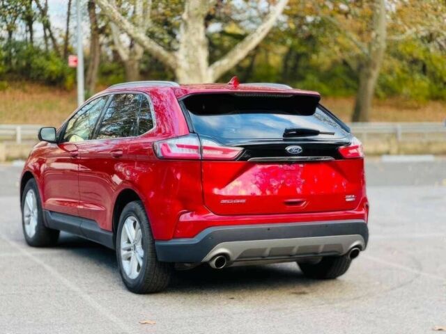 Красный Форд Эдж, объемом двигателя 2 л и пробегом 33 тыс. км за 17000 $, фото 5 на Automoto.ua