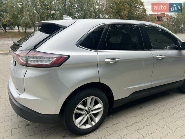 Сірий Форд Едж, об'ємом двигуна 2 л та пробігом 146 тис. км за 15799 $, фото 5 на Automoto.ua