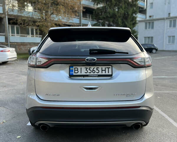 Сірий Форд Едж, об'ємом двигуна 2 л та пробігом 145 тис. км за 16800 $, фото 3 на Automoto.ua