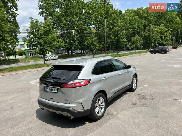 Серый Форд Эдж, объемом двигателя 2 л и пробегом 210 тыс. км за 19000 $, фото 1 на Automoto.ua