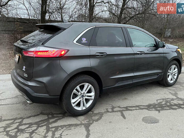 Серый Форд Эдж, объемом двигателя 2 л и пробегом 221 тыс. км за 17000 $, фото 4 на Automoto.ua